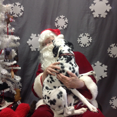 Rainbow - She's kissing Santa to make up for being on the naughty list!