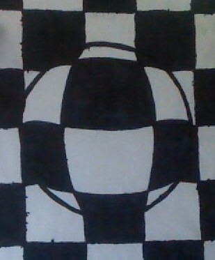 Illusionary Black and White Checkered Ball