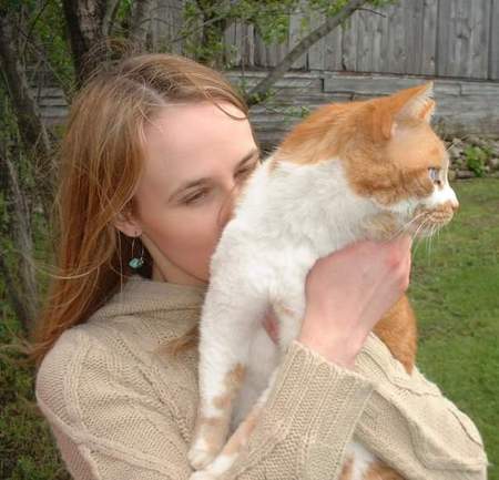 Maggie Barron and barn kitty