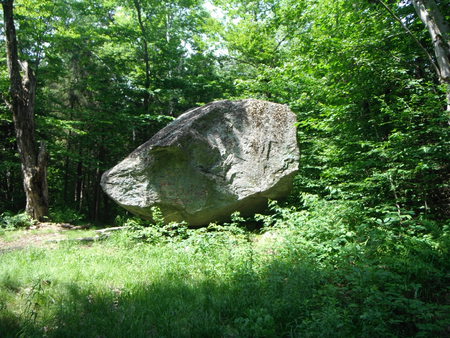 A rock balances in Savoy