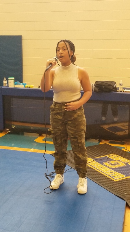 Hailey Coleman Singing the National Anthem. Estimated crowd 600 people .