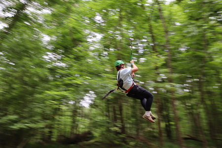 Entry image for Kesem at Auburn - Ziplining through Camp. Clicking this image will show a larger photo