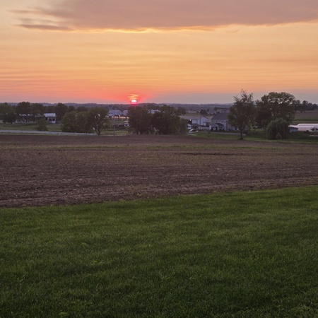 Sunset over farms